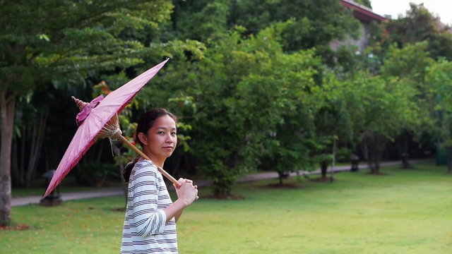 oriental red umbrella with asian girl