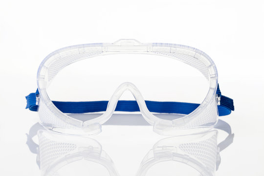 Clear Safety Glasses Against On White Background