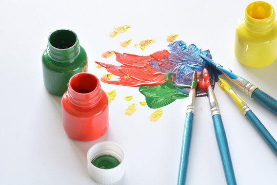 watercolors and brushes