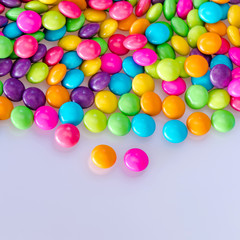 Fototapeta na wymiar Colorful chocolate candy on backgrounds