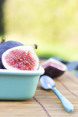 Delicious fresh figs in orange paper