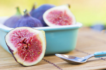 Delicious fresh figs in orange paper