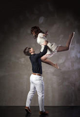 Beautiful couple in the active ballroom dance