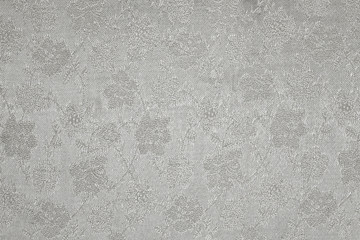 white background Satin fabric with floral pattern closeup
