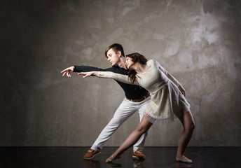 Beautiful couple in the active ballroom dance