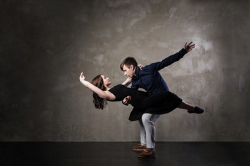 Beautiful couple in the active ballroom dance