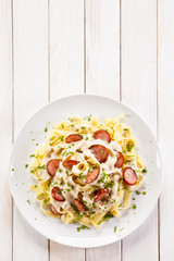 Pasta with sausages and vegetables 