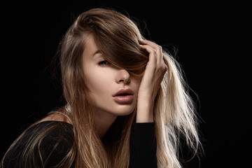 Beautiful glamorous woman with tousled hair.