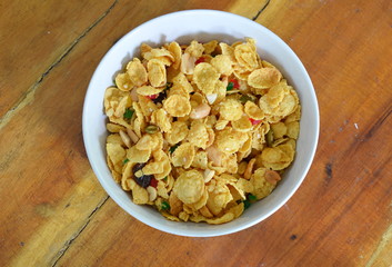 cornflakes in bowl on table