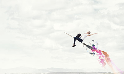 Girl fly on broom