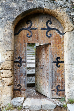 Ajar old wooden door