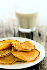 Pancakes on white plate