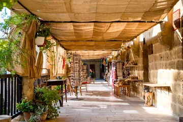  Buyuk Han (The Great Inn) Medieval caravanserai that turned into touristic center with an antique souvenir shops, craft workshops and cafes in Nicosia, Cyprus on August 10,2015 © kirill_makarov