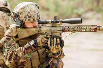 Fototapeta premium Rangers team is fighting on the territory occupied by the enemy