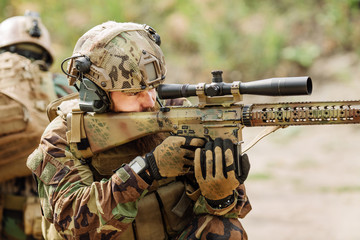 Fototapeta premium Rangers team is fighting on the territory occupied by the enemy