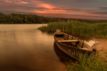 Fototapeta na wymiar boat in sunset