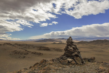 Fototapeta na wymiar A pile of stones ritual in Mongolia