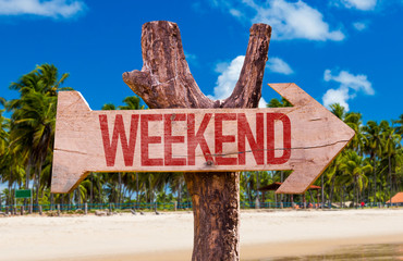 Weekend arrow with beach background