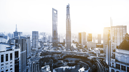 panorama of skyscrapers in a modern city under sunbeam