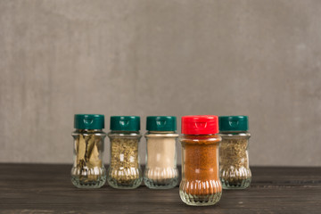 Spices and herbs in  bowls.