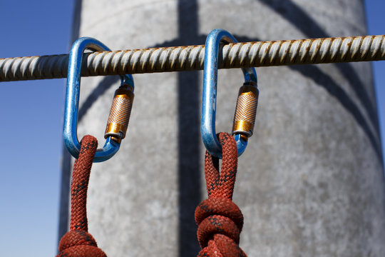 safety when working at height. equipment for working at height.  two Carabiner and ropes fixed on a ladder telecommunications tower