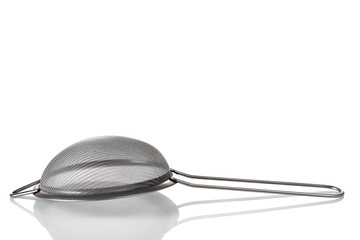 one utensil strainer on a white isolated background