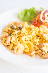 Scramble eggs for breakfast