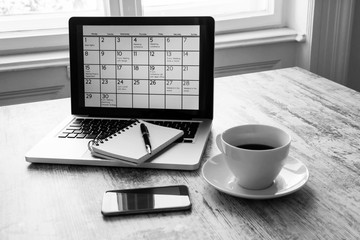 Checking monthly activities in the calendar in the laptop