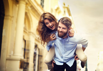 Happy couple making jokes