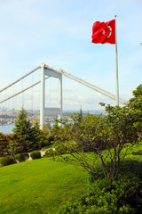 View of the Turkish Flag and the Fatih Sultan Mehmet Bridge photo, taken from Otagtepe, Beykoz in Istanbul, Turkey