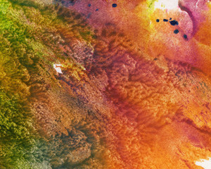 Abstract watercolor background on the sheet of paper