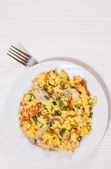 scrambled eggs with mushrooms and vegetables