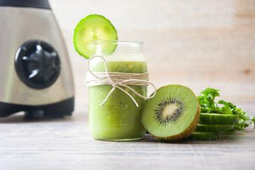 Green smoothie with cucumber,kiwi and apples