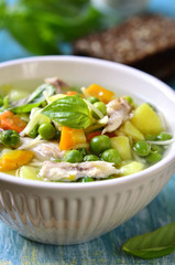Vegetable soup with chicken and vermicelli.