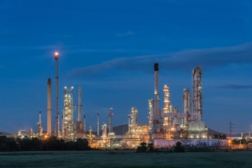 Fototapeta na wymiar Oil refinery at twilight with sky background.