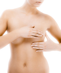 Naklejka premium Woman examining her breast isolated on white background 