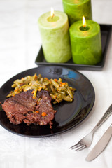 Candlelight dinner. Meat steamed 