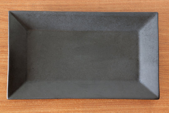 Rectangle black plate on the table
