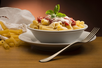 dish with macaroni and tomato sauce