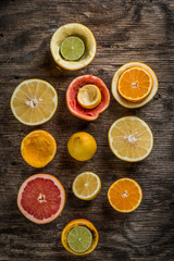 Fototapeta na wymiar Set of sliced citrus fruits lemon, lime, orange, grapefruit with