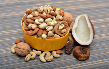 Set of Dry Fruits in a Bowl & Coconut Shell