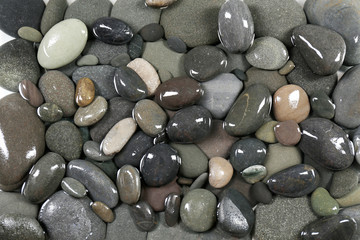 Gray sea pebbles background