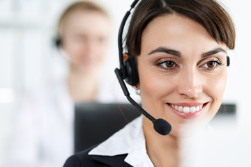Female call center service operator at work