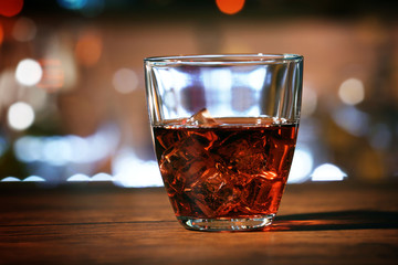 Glass of cocktail on the bar counter