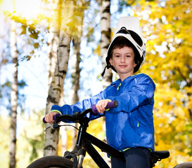 Fototapeta na wymiar Boy biking