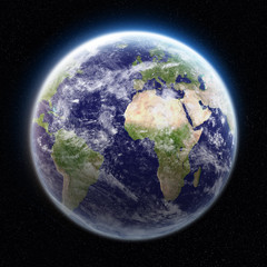 Sunrise over planet Earth in space