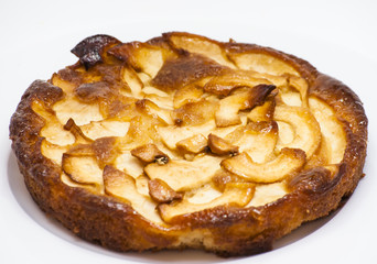 Apple pie on a white plate