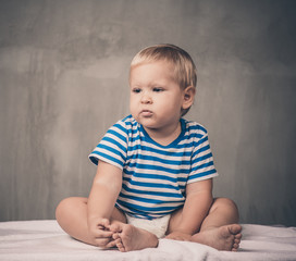 Fototapeta premium portrait of thinking baby boy