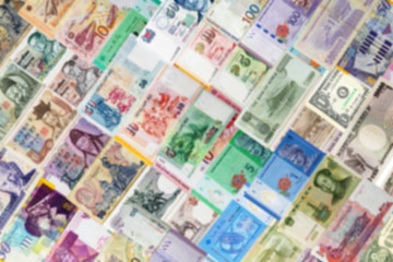 Blurred of international moneys background.