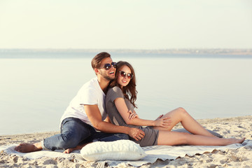 Fototapeta premium Young couple on the riverside